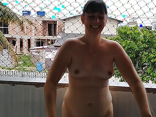 Wife Works Nude On Balcony Teasing Her Cuckold Husband free video