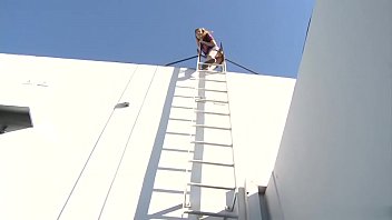 Naughty Nicole Ray Fucks Stud Bill Bailey On A Building Roof free video